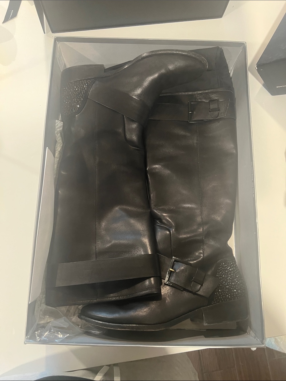 Brian Atwood Black Knee-High Leather Boots with Buckle and Studded Heel Accent